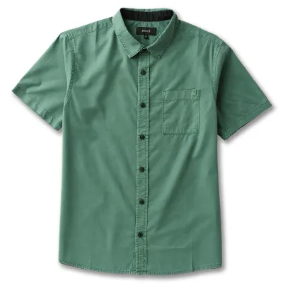 Flat lay front view of Roark short sleeve shirt in faded slate green with button front and chest pocket detail.