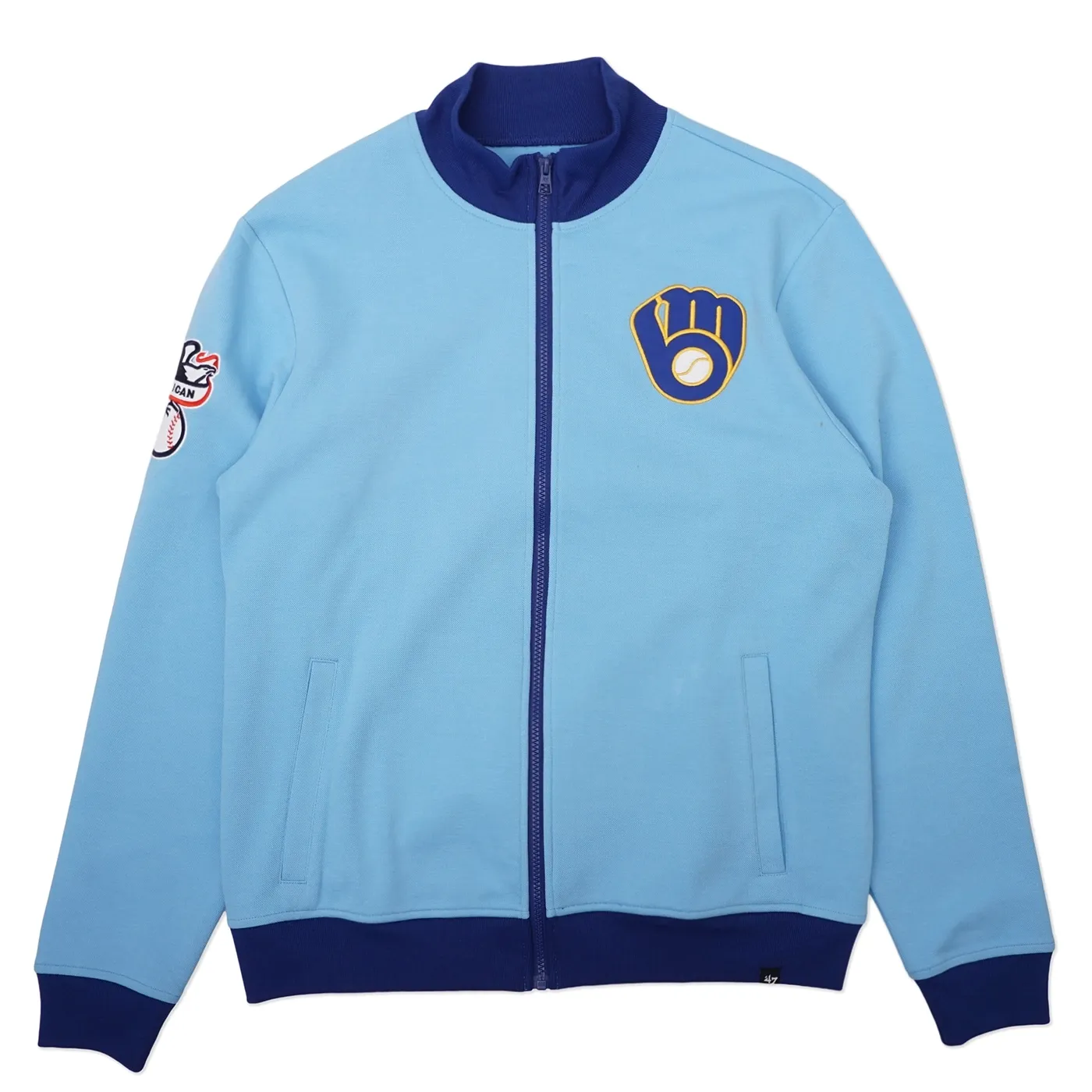 Front view of Milwaukee Brewers track jacket in powder blue with navy trim and embroidered glove logo.