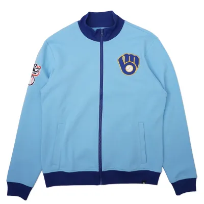 Front view of Milwaukee Brewers track jacket in powder blue with navy trim and embroidered glove logo.