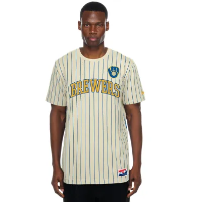 Model wearing cream Brewers Cooperstown pinstripe T-shirt with blue vertical stripes and arched Brewers lettering.