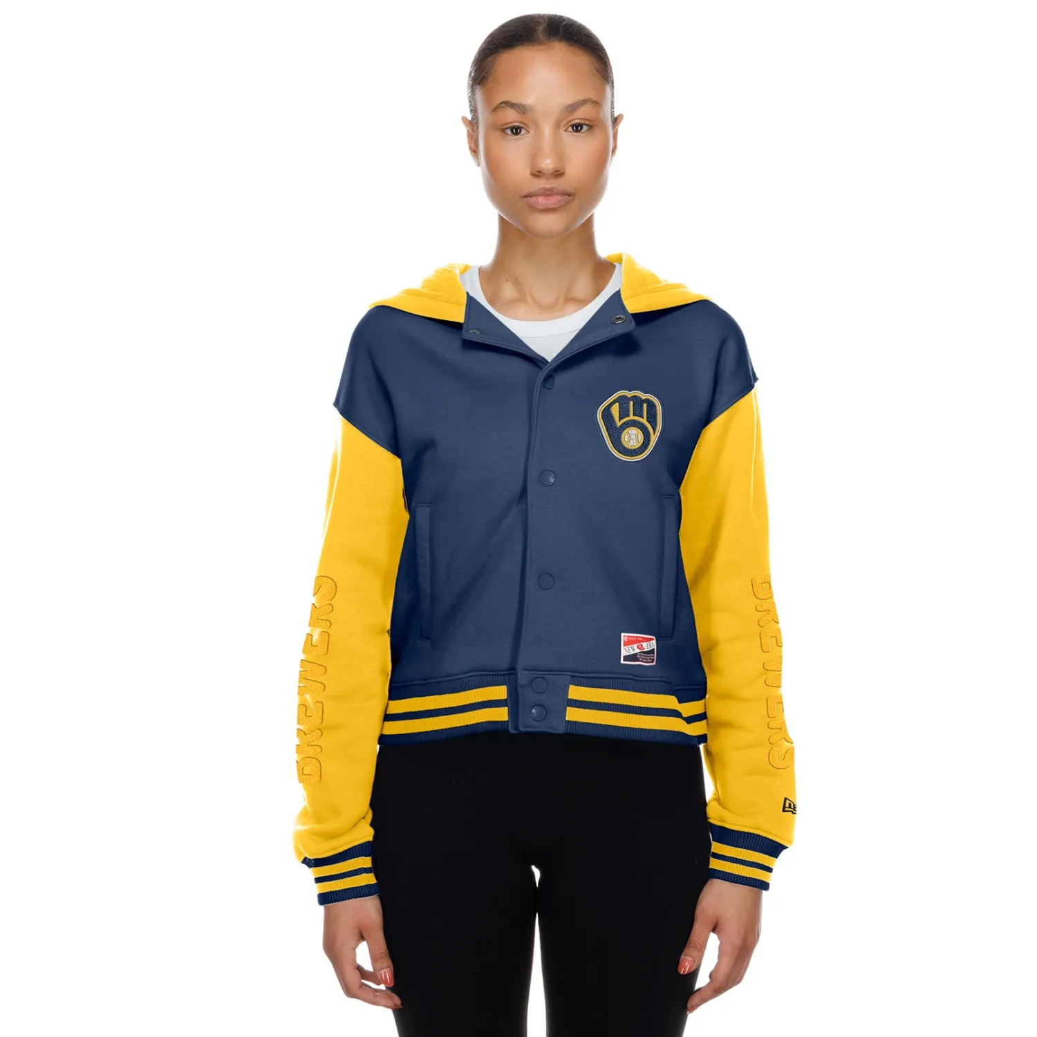 Model wearing Brewers women's snap-front hooded jacket with gold sleeves, navy body, and embroidered team logo.
