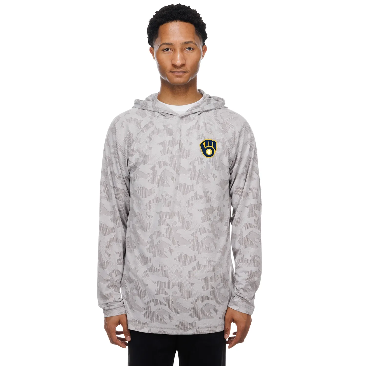 Model wearing grey camo Brewers long sleeve hood tee with lightweight fabric and small team logo.