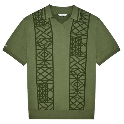 Flat lay of Malbon Habana Polo in Olivine highlighting collar and sleeve embroidery