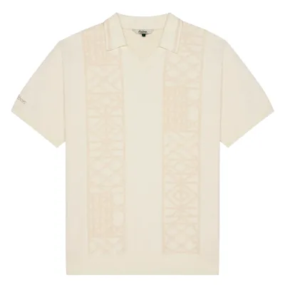 Flat lay of Malbon Habana Polo highlighting collar and sleeve embroidery