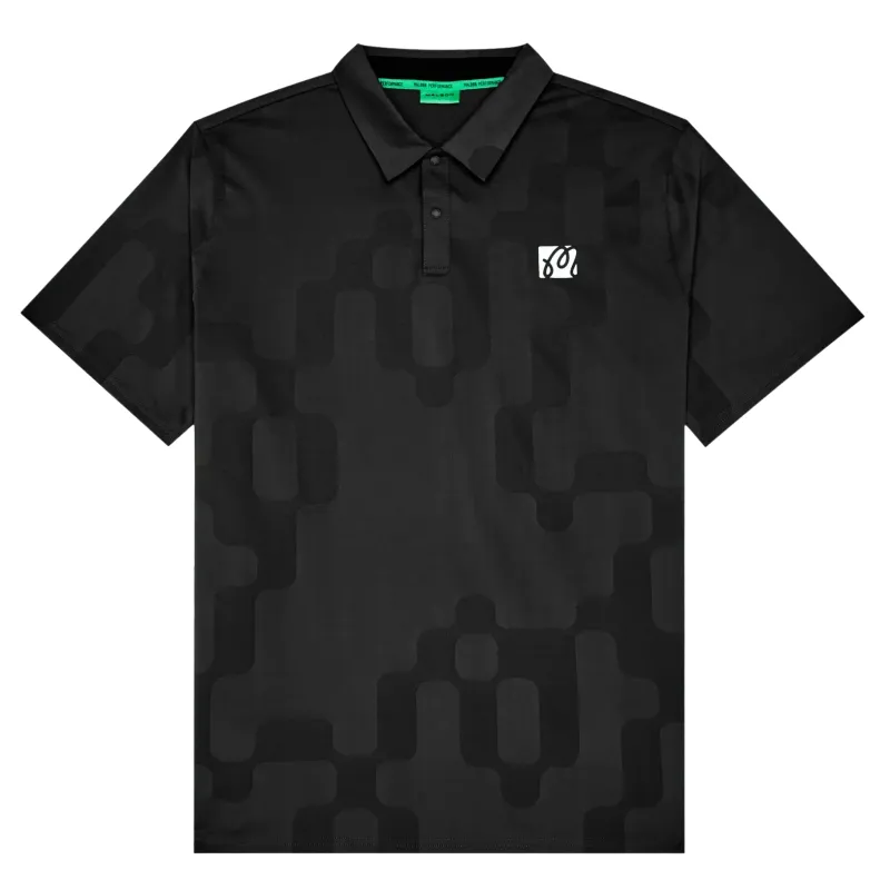 Performance Mesh Paneled Polo laid flat showing tonal jacquard pattern and chest logo