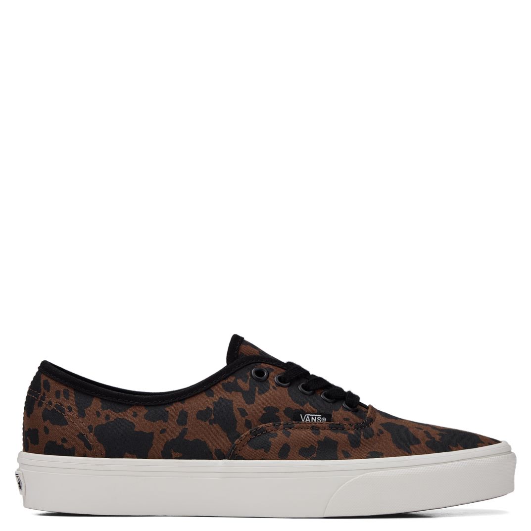 Side profile of Vans Authentic Animalier Cow Print sneaker in brown and black canvas with white sole.