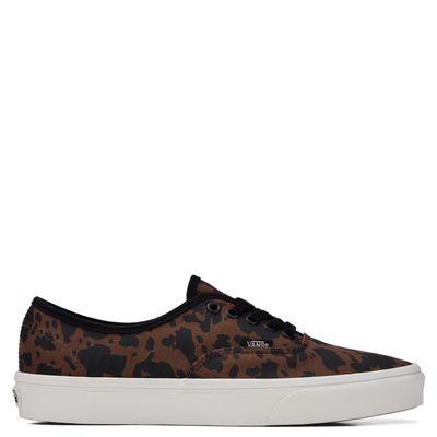 Side profile of Vans Authentic Animalier Cow Print sneaker in brown and black canvas with white sole.
