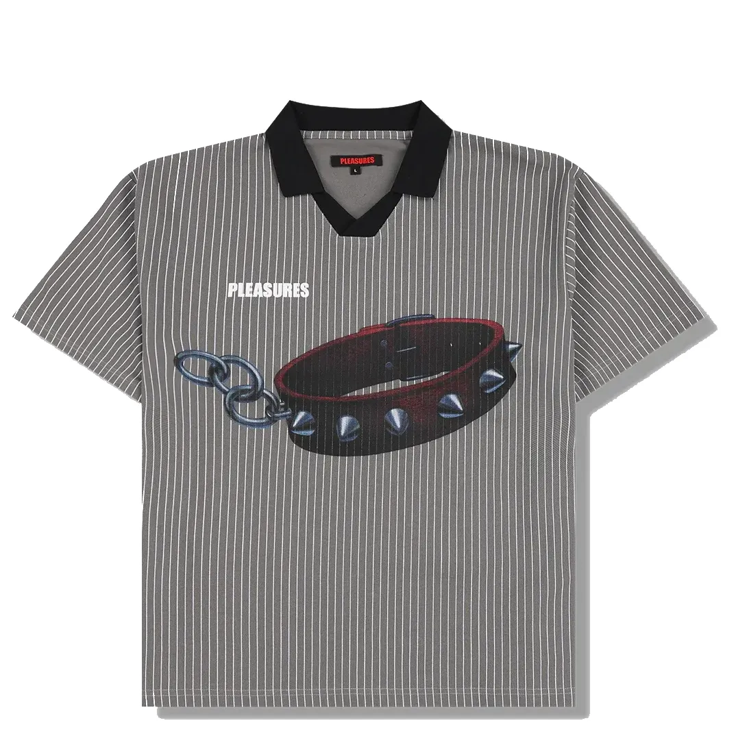 Front flat lay of PLEASURES Pet Polo featuring bold dog collar graphic with chain detail and PLEASURES logo text.