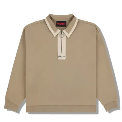 Front flat lay of tan Pleasures Drift Zip Polo with contrast collar.