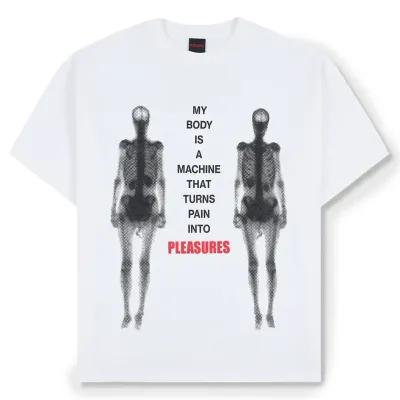 Front flat lay of white Pleasures Machine Tee with “My body is a machine that turns pain into Pleasures” graphic.