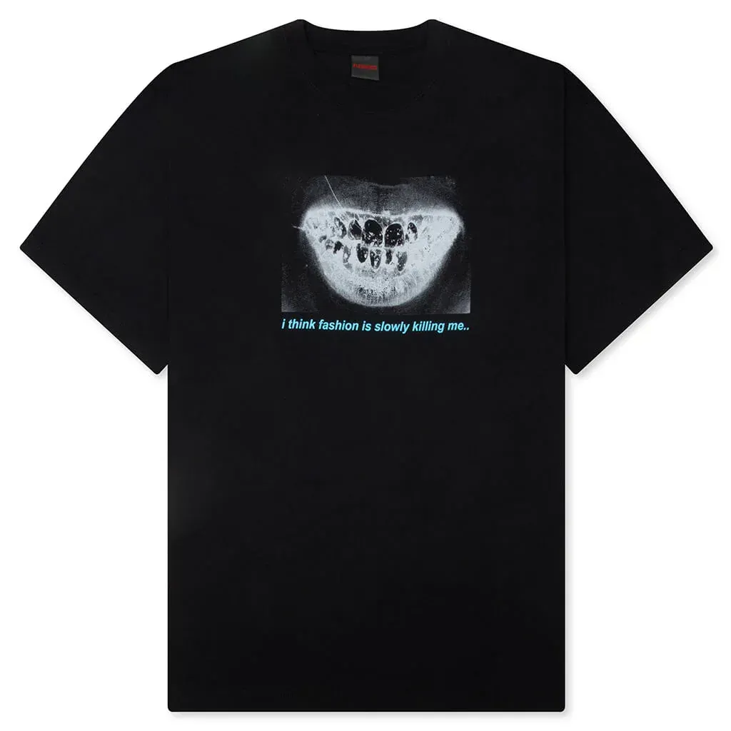 Front flat lay of Pleasures Decay Tee in black with skull print graphic.