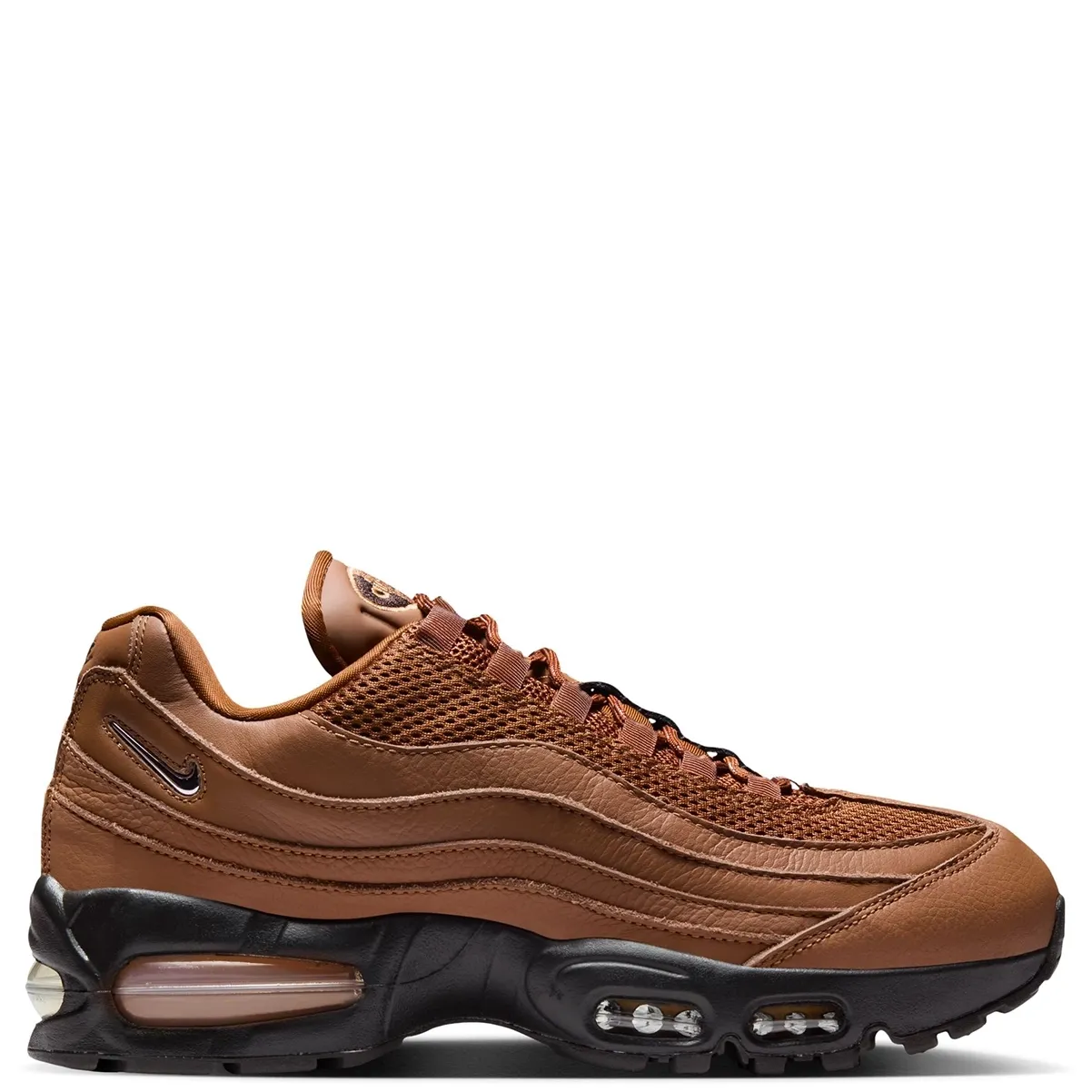 Medial side profile showing textured leather waves and black outsole detailing.