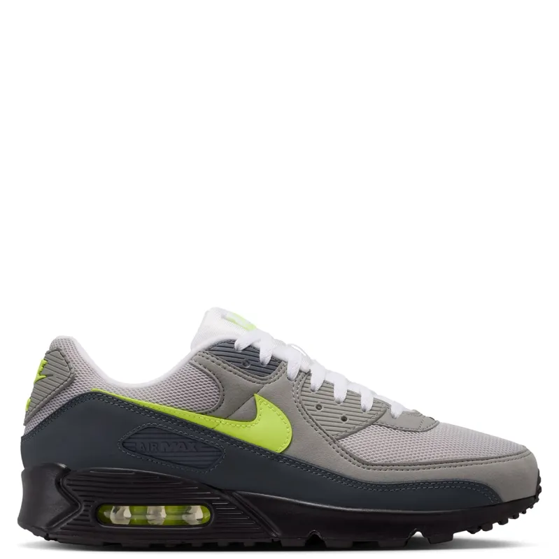 Side profile of Nike Air Max 90 with visible neon green Air unit and black midsole.