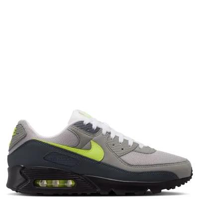Side profile of Nike Air Max 90 with visible neon green Air unit and black midsole.