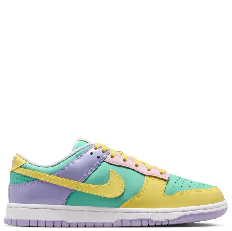 Lateral side view of Nike Dunk Low Retro sneaker with pastel green upper and lavender heel overlay