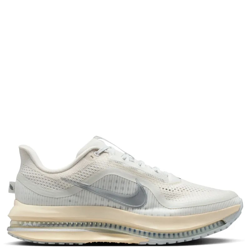 Medial side view showing translucent ribbed upper and silver Swoosh.