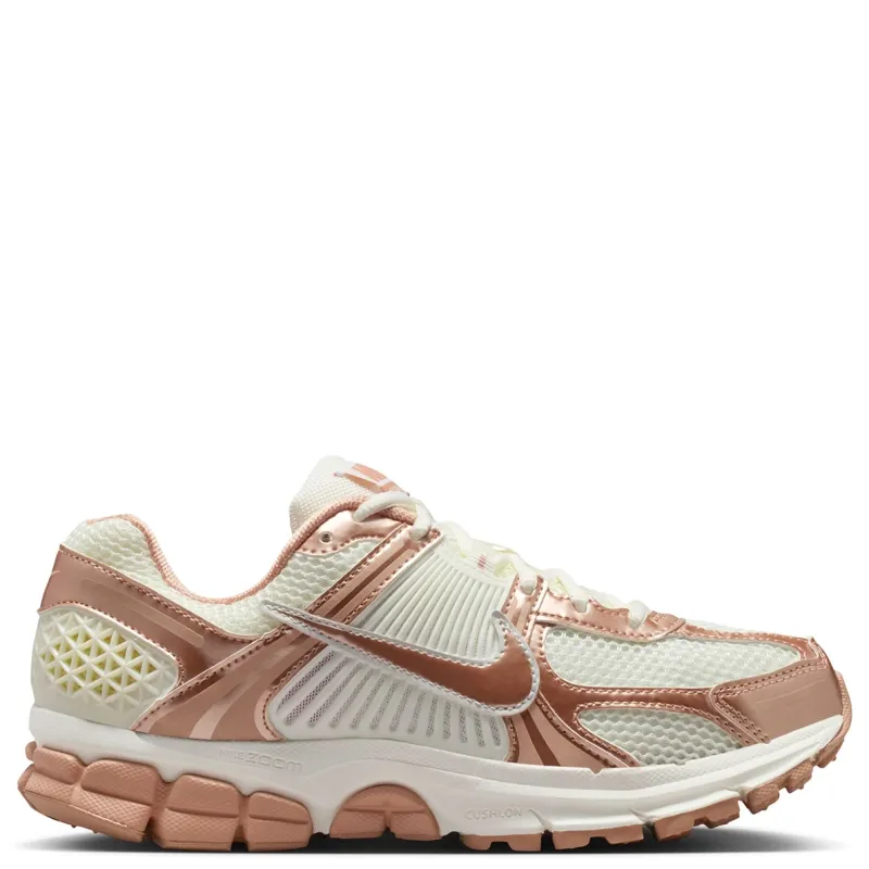 Medial side profile of Vomero 5 with layered synthetic leather detailing