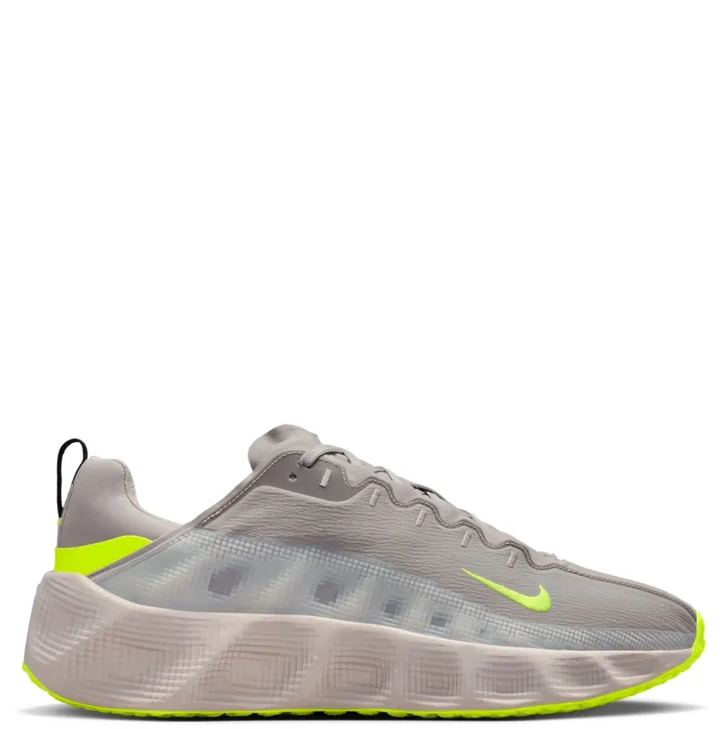 Lateral angle of Nike Ava Rover showing sculpted ReactX midsole and neon outsole