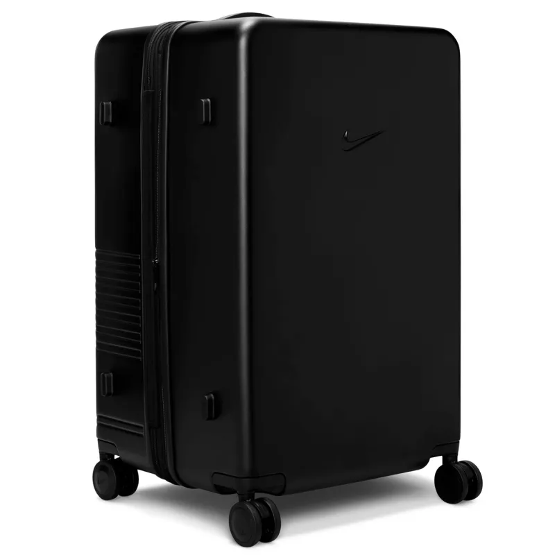 Three-quarter rear view of black Nike checked luggage with smooth hardshell finish