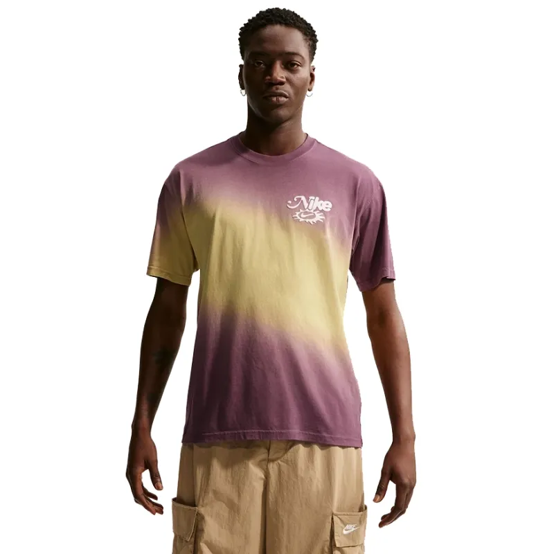 Lifestyle view of model wearing Buff Gold/Tattoo dip dye tee with cargo shorts.