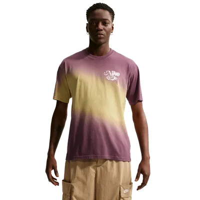 Lifestyle view of model wearing Buff Gold/Tattoo dip dye tee with cargo shorts.