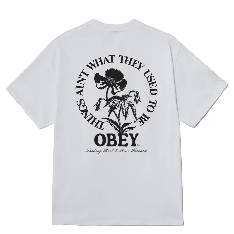 back Graphic On OBEY Move Forward Tee Featuring Floral Artwork And Circular Text Design.
