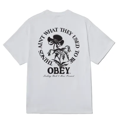 back Graphic On OBEY Move Forward Tee Featuring Floral Artwork And Circular Text Design.