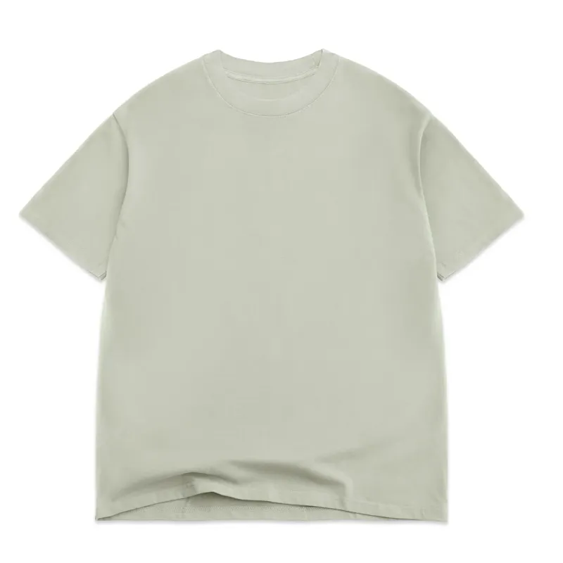 Front View Of Cotton Collective Oversized Box Tee In Sage Green With Relaxed Fit.