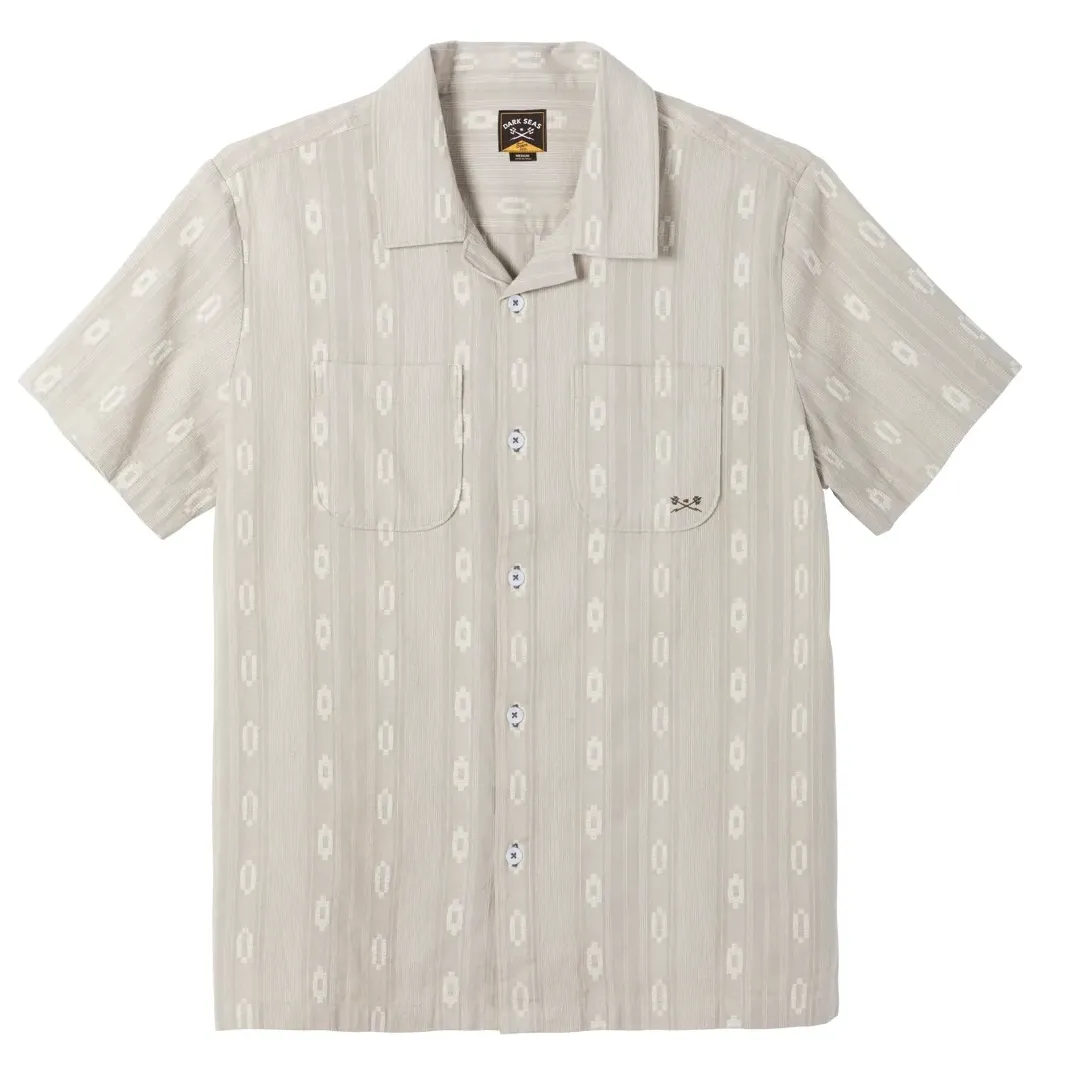 Front View Of Dark Seas Breezy Shirt In Moss With Button Front, Dual Chest Pockets, And Subtle Patterned Fabric.