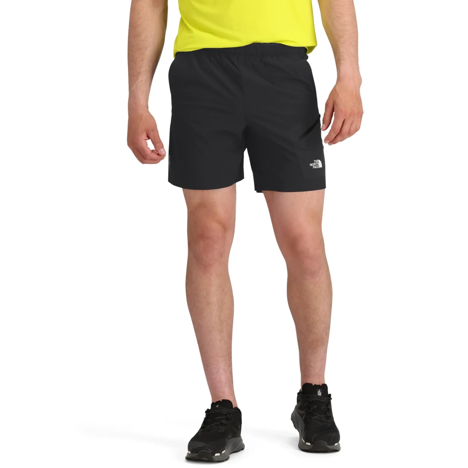 Model Wearing The North Face Lightstride 7 Inch Running Shorts In Black Front View.