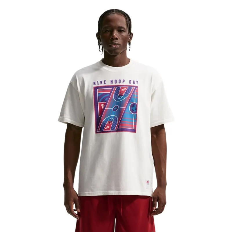 Front view of Nike Hoop Day tee with colorful basketball court graphic and “Nike Hoop Day” text.