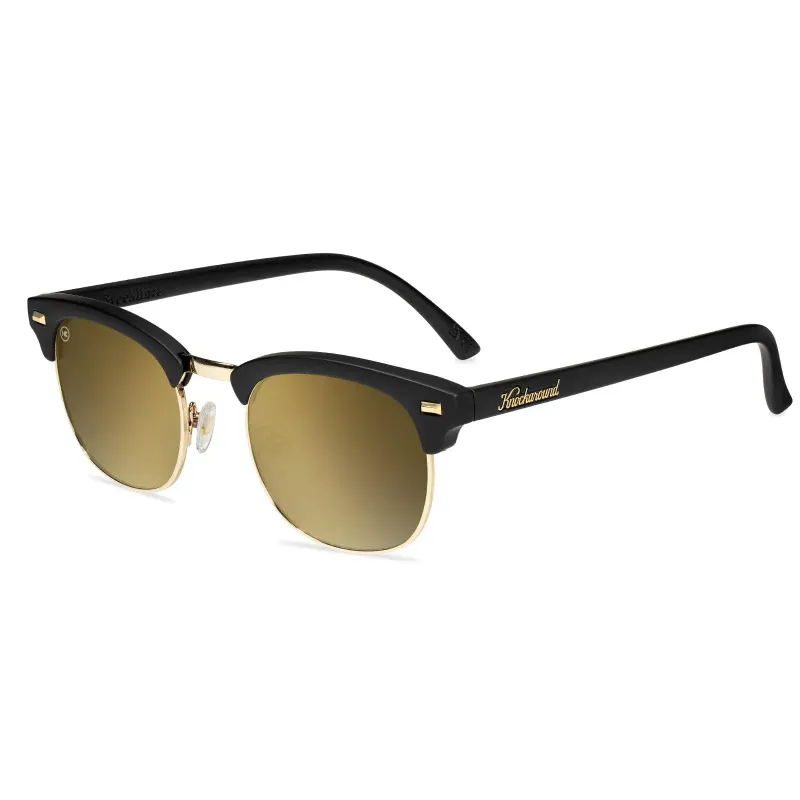 Angled view of Knockaround Brooklines sunglasses with black acetate browline frame and gold metal lower rims