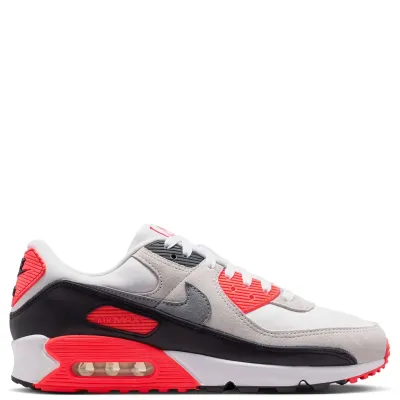 Side profile of Nike Air Max 90 sneaker highlighting visible Air Max cushioning and infrared midsole.