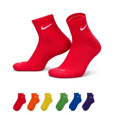 Nike Everyday Plus ankle socks 6-pack featuring red, orange, yellow, green, blue, and purple socks with white Swoosh logos.