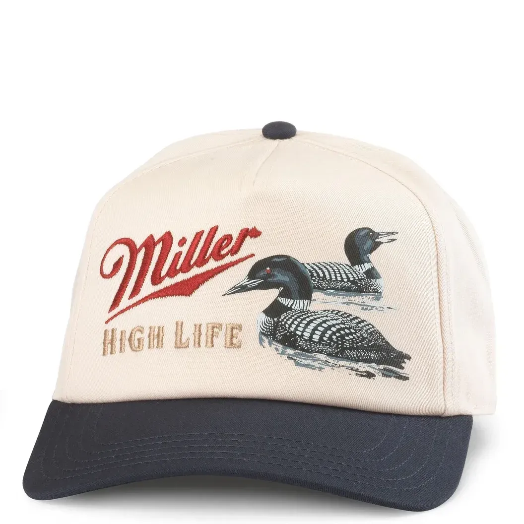 Front view of Miller High Life hat with embroidered script logo and duck graphic on cream crown with navy brim
