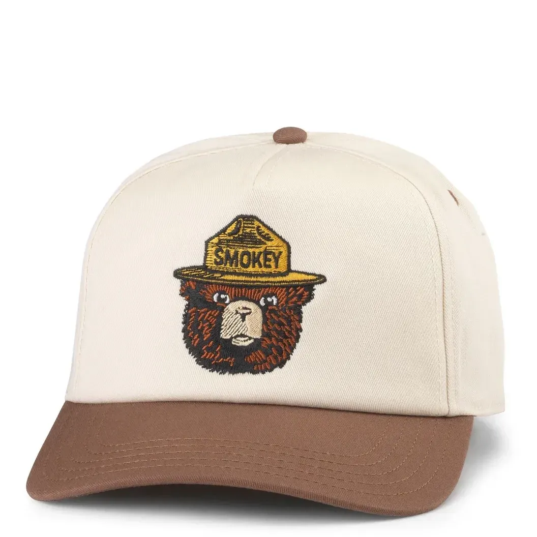 Front view of American Needle Smokey Bear cap with embroidered ranger bear logo on cream crown and brown brim