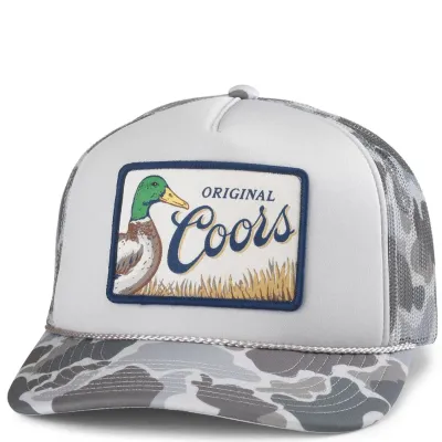 Front view of Coors trucker hat with mallard duck patch, white foam crown, and camo brim