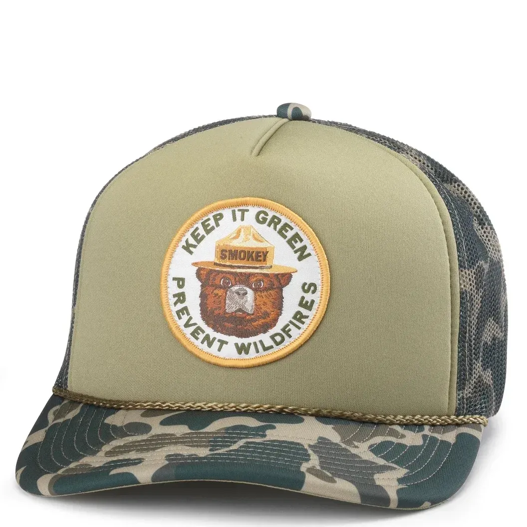 Front view of Smokey Bear trucker hat with “Keep It Green Prevent Wildfires” patch and camo brim