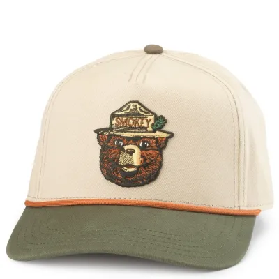 Front view of cream and olive Smokey Bear snapback hat with embroidered character logo