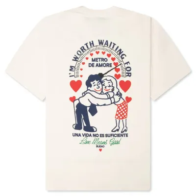 Bueno cream t-shirt back with cartoon couple hugging and Metro De Amore graphic