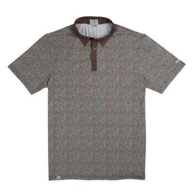 Front view of sky blue performance polo with brown collar and allover paisley print