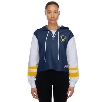 Model wearing Milwaukee Brewers cropped lace-up hoodie in navy with contrast sleeves and relaxed fit