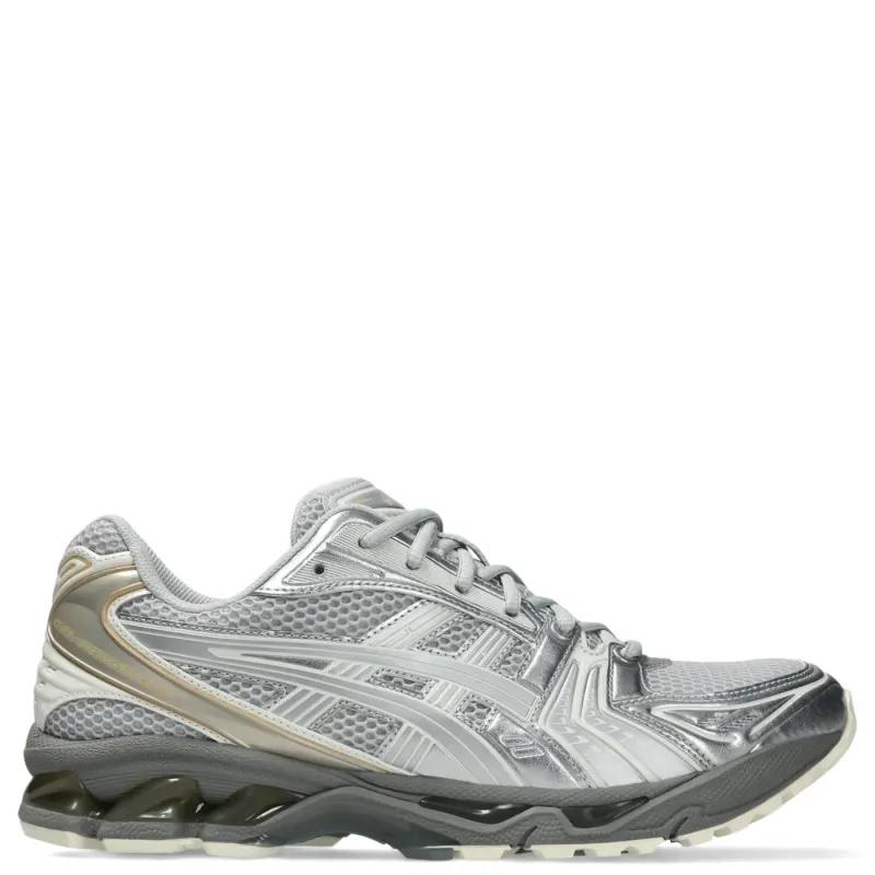 Medial side view of ASICS GEL-Kayano 14 displaying mesh paneling, stability features, and cushioned midsole.