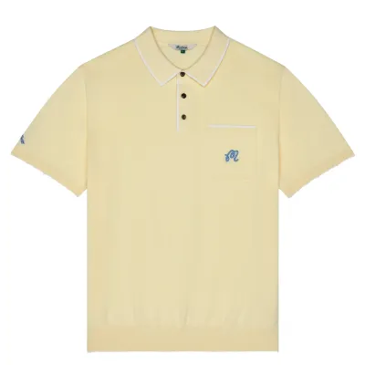 Front flat lay of soft yellow knit polo with chest pocket and embroidered logo detail