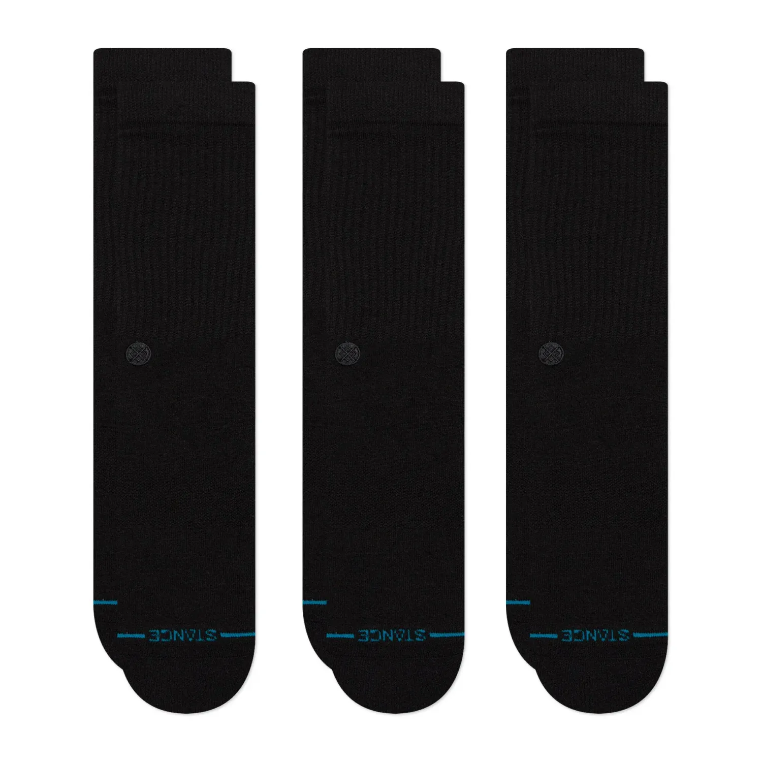 Top-down view of three pairs of black crew socks laid flat, highlighting ribbed texture and minimal design