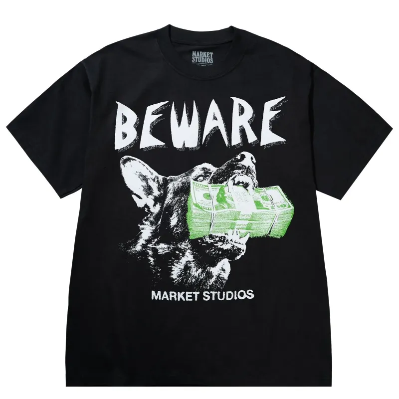Front view of Market Studios washed black t-shirt with “BEWARE” text and bulldog graphic holding cash