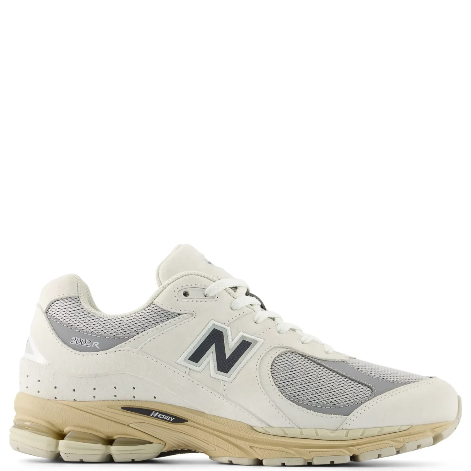 Side profile of the New Balance 2002R in Linen and Raincloud with suede overlays, mesh underlays, and cushioned sole