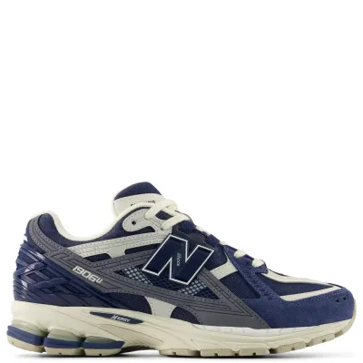 Side profile of the New Balance 1906N in Navy and Timberwolf with mesh upper and layered synthetic overlays