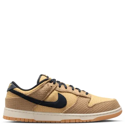 Nike Dunk Low Retro SE medial side view in neutral tones with textured woven panels and low profile design