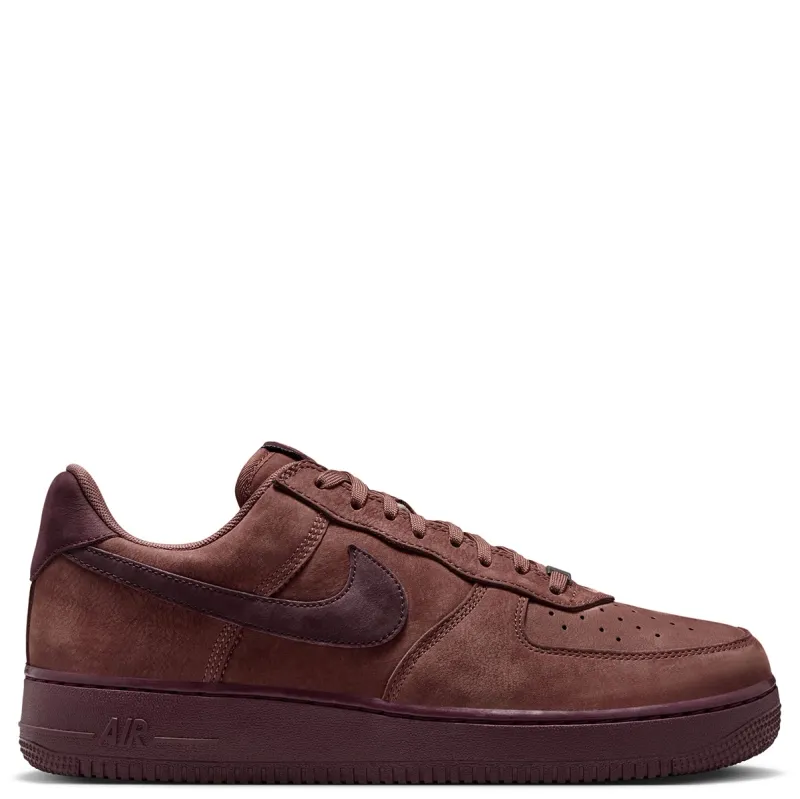 Nike Air Force 1 Low Retro Premium medial side view with smooth leather upper and monochrome design